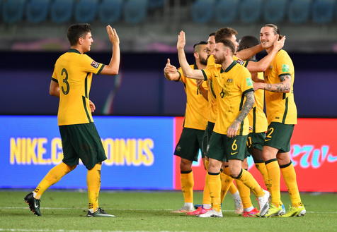 epa09246211 Players of Australia celebrate after scoring a goal during the Group B Asian Qualifiers for the FIFA World Cup Qatar 2022 and AFC Asian Cup China 2023 Soccer match between Kuwait and Australia at Jaber Al-Ahmad International Stadium in Kuwait City, Kuwait, 03 June 2021.  EPA/Noufal Ibrahim