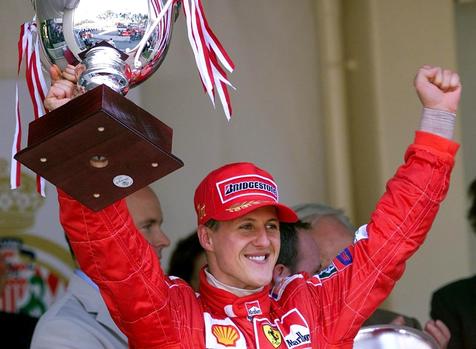 German Ferrari driver Michael Schumacher hold his trophy on the podium of the Monaco racetrack, 27 May 2001, after winning the 59th Formula One Grand Prix. ANSA/GERO BRELOER