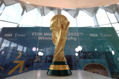 epa09777055 General view of the FIFA World Cup Qatar 2022 Winner's Trophy on display in Warsaw Poland, 22 February 2022.  EPA/LESZEK SZYMANSKI POLAND OUT