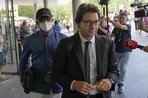 epa10023730 Former FC Barcelona's player Samuel Eto'o (L) and his former agent Jose Maria Mesalles (R) go out of the court after they pleaded guilty of tax offense charges in Barcelona, Spain, 20 June 2022. Eto'o accepted a 22-month jail sentence and pay a fine of 181 million euro after he admitted that he defrauded the Spanish Tax Department of 3.87 million euro between 2006 and 2009. His former agent Mesalles accepted one-year jail sentence for the same charges and he will pay a fine of 905,155 euro.  EPA/ALEJANDRO GARCIA