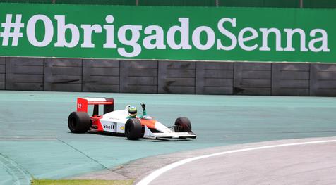 epa08003996 Bruno Senna, nephew of Brazilian Formula One legend Ayrton Senna, drives a McLaren MP4/4 racing car, in which Ayrton won his first Formula One world championship title in 1998, during a tribute prior to the Brazilian Formula One Grand Prix in Interlagos circuit in Sao Paulo, Brazil, 17 November 2019.  EPA/FERNANDO BIZERRA JR.